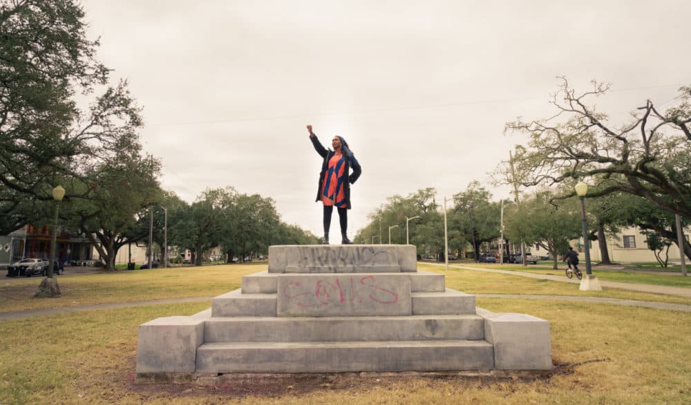 Tulane Professor of Art History Dr. Mia Bagneris poses for a portrait atop the empty platform of the former Jefferson David monument in New Orleans, LA., in early February 2021. (Jennifer Ortiz for WBUR)