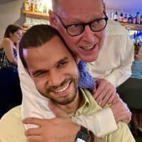 Dr. Paul Farmer with Wilfredo Matias, after his graduation from the residency in global health equity at the Brigham and Women's Hospital in June 2021. (Courtesy WIlfredo Matias)