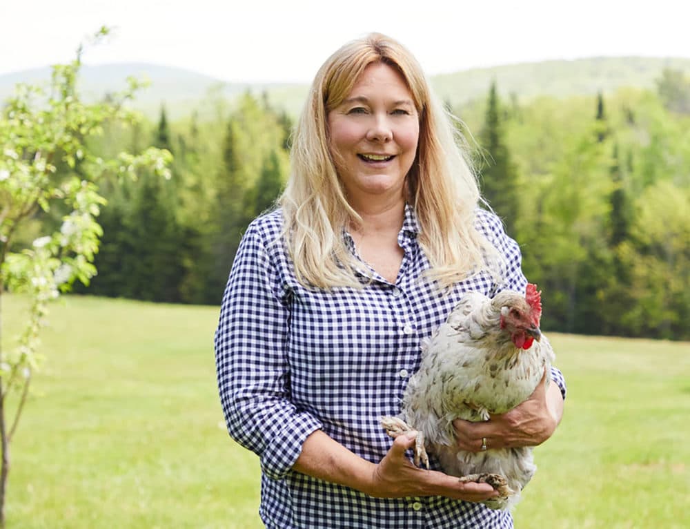 "The Fresh Eggs Daily Cookbook" author Lisa Steele with a chicken. (Tina Rupp)