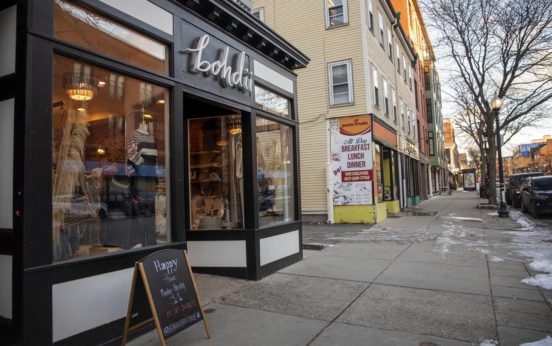 Bohdii is a boutique at 398 West Broadway. The next stores on the street are a closed diner and spa. (Robin Lubbock/WBUR)