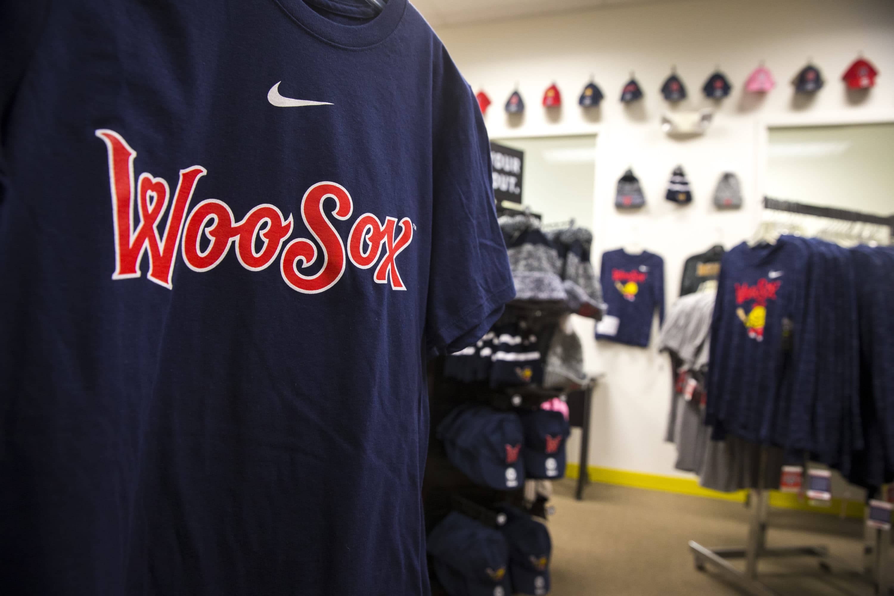 Worcester WooSox Red Sox hats are on display during the Worcester News  Photo - Getty Images