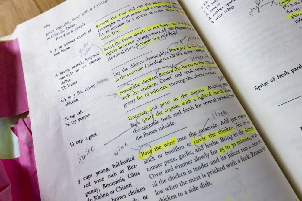 Julia Child’s recipe for coq au vin from the first edition of her book, “Mastering the Art of French Cooking,” with notes from food stylist Christine Tobin. (Jesse Costa/WBUR)