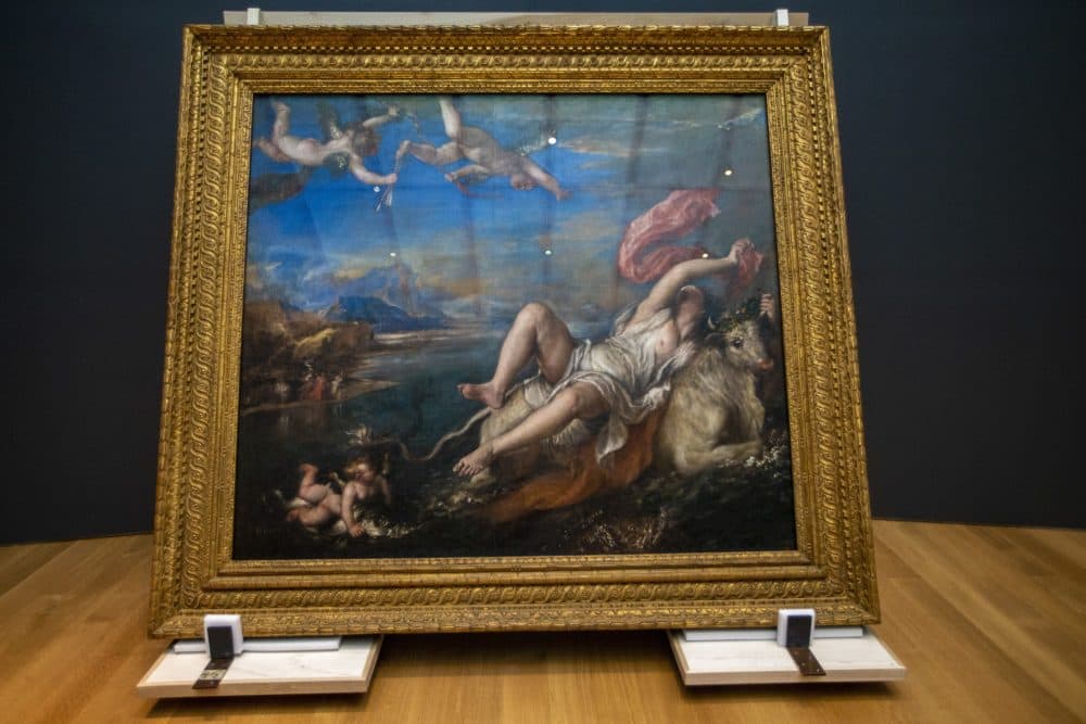 Installers move Titian’s "The Rape of Europa." (Jesse Costa/WBUR)