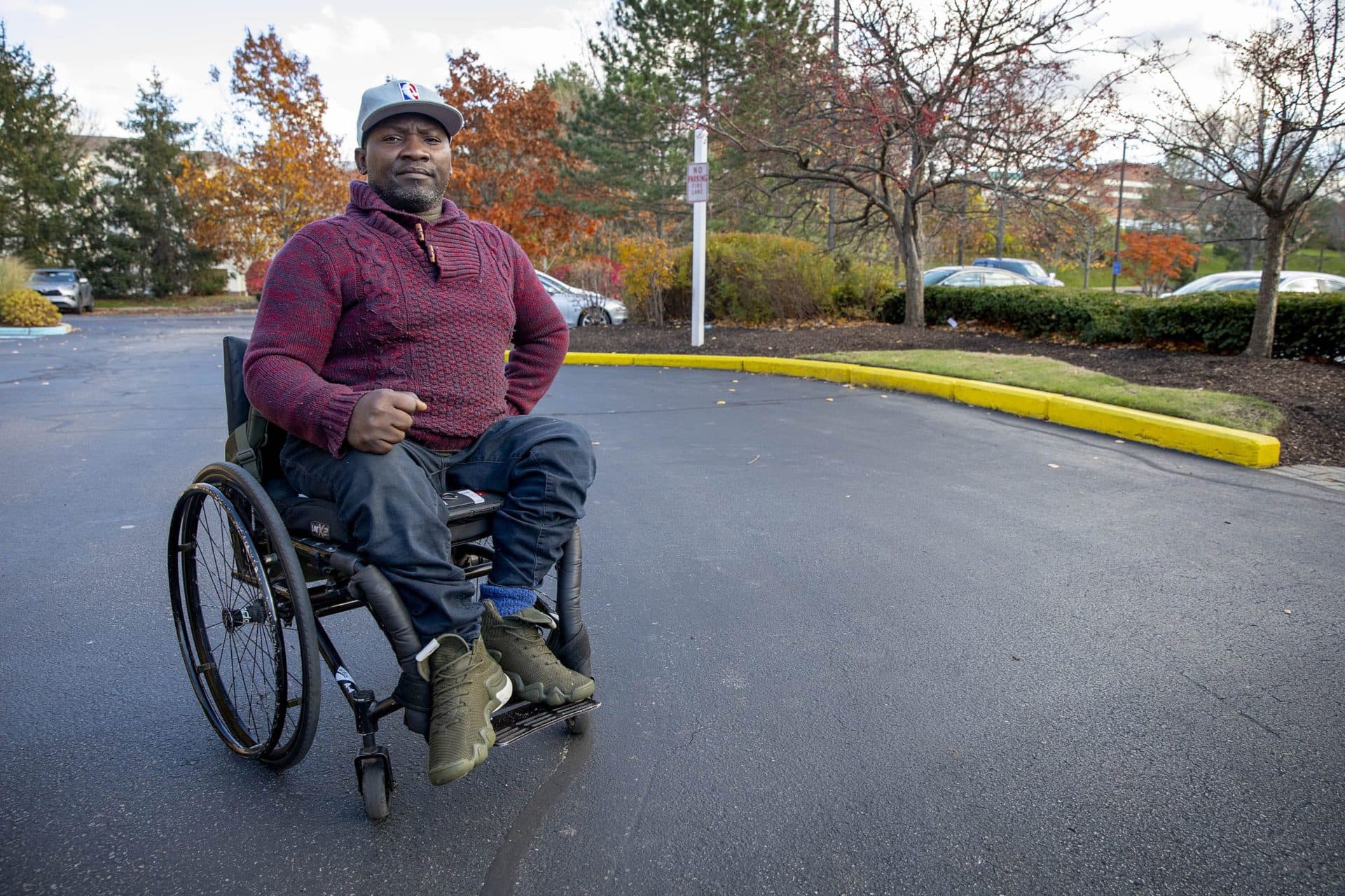 Murshid Buwembo missed work and had to skimp on groceries and other purchases after a wheelchair breakdown. (Robin Lubbock/WBUR)