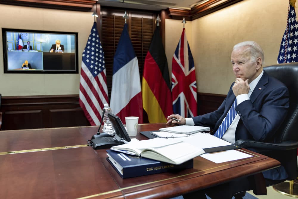 In this image provided by the White House, President Biden listens during a secure video call with French President Emmanuel Macron, German Chancellor Olaf Scholz and British Prime Minister Boris Johnson in the Situation Room at the White House on March 7, 2022, in Washington. (Adam Schultz/The White House via AP)