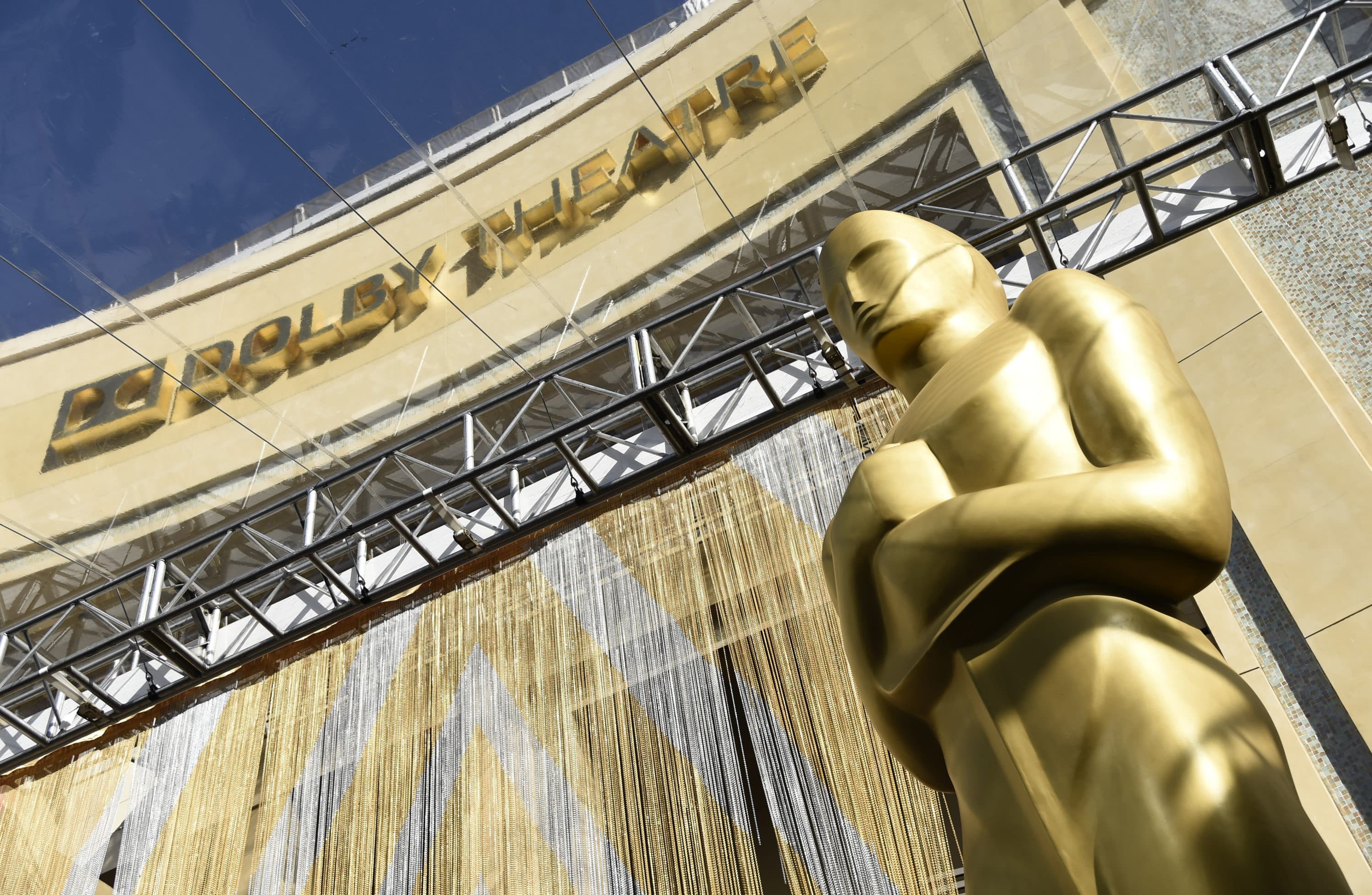An Oscar statue is pictured underneath the entrance to the Dolby Theatre on Feb. 24, 2016, in Los Angeles. The Oscars will be held on Sunday, March 27 at the Dolby Theatre in Los Angeles. The ceremony is set to begin at 8 p.m. ET and will be broadcast live on ABC. (Chris Pizzello/Invision/AP)