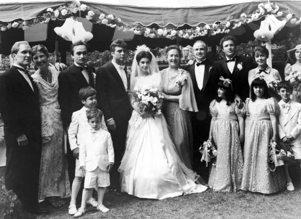 The cast of the film "The Godfather" pose for a family portrait during the wedding scene in a still from the film, directed by Francis Ford Coppola and based upon the novel by Mario Puzo. Left to right: Robert Duvall, Tere Livrano, John Cazale, Gianni Russo, Talia Shire, Morgana King, Marlon Brando and James Caan.  (Paramount Pictures/Getty Images)