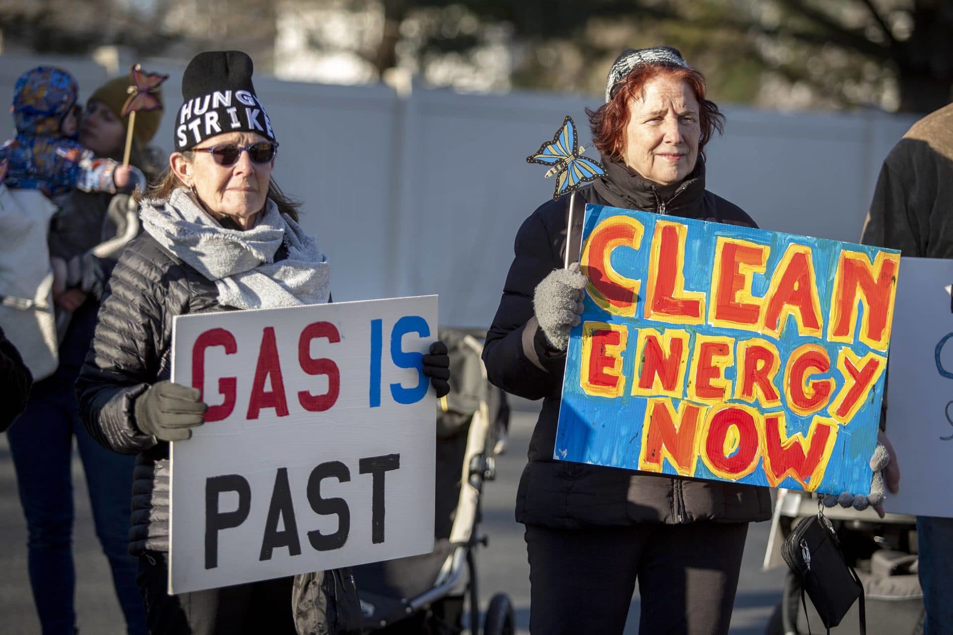 Protesters at a march to stop the construction of a new gas peaker power plant in Peabody. (Robin Lubbock/WBUR)