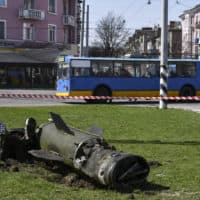 A fragment of a Tochka-U missile lies on the ground following an attack at the railway station in Kramatorsk, Ukraine, Friday, April 8, 2022. A missile has hit a crowded train station in eastern Ukraine that was an evacuation point for civilians fleeing the war. Ukrainian President Volodymyr Zelenskyy said at least 30 were killed during Friday's strike. (Andriy Andriyenko/AP)