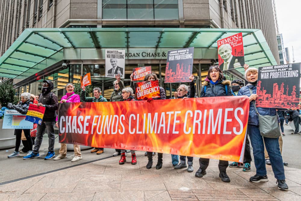 As part of Earth Week, Rise and Resist climate activists held a peaceful protest at JPMorgan Chase headquarters world headquarters in Manhattan to protest CEO Jamie Dimon's "Marshall Plan" which will aggressively increment fossil fuel production, and boost Chase profits, increasing carbon emissions worldwide. (Photo by Erik McGregor/LightRocket via Getty Images)
