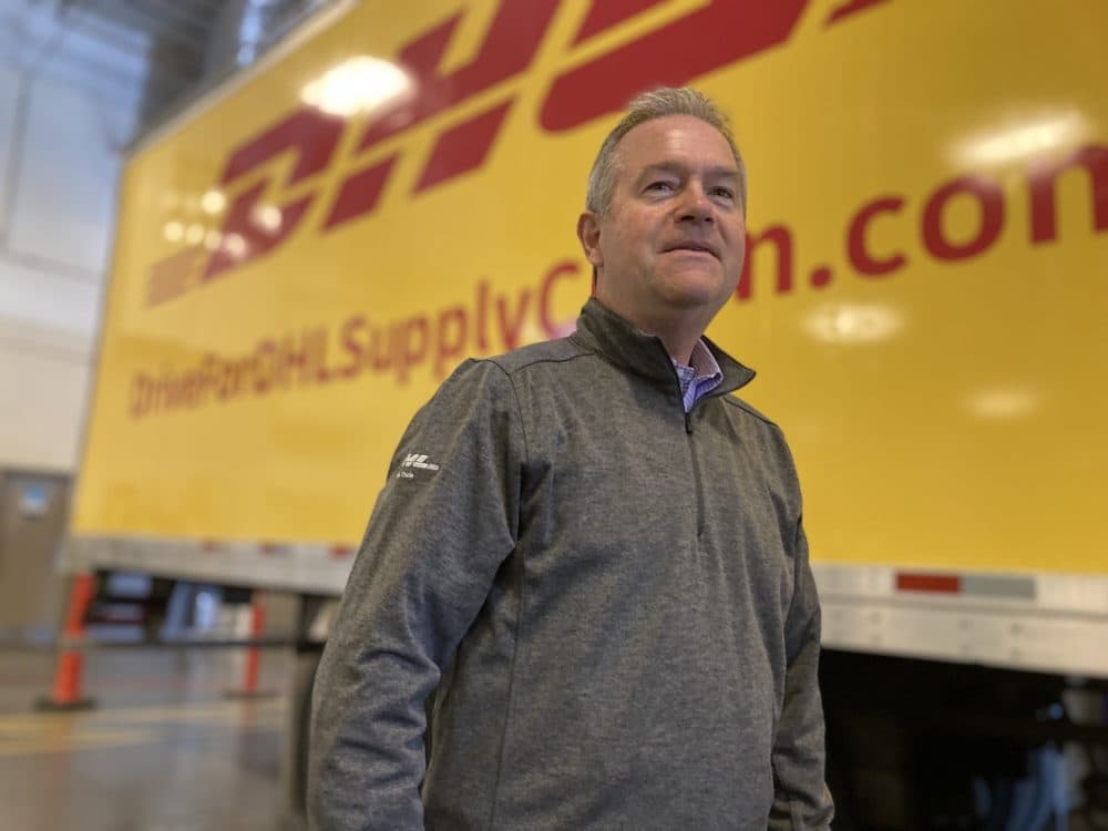 Jim Monkmeyer, an executive with DHL Supply Chain, sees the potential of being an early adopter of autonomous trucks. DHL is already using TUSimple trucks to make deliveries in Texas. (Peter O'Dowd/Here & Now)