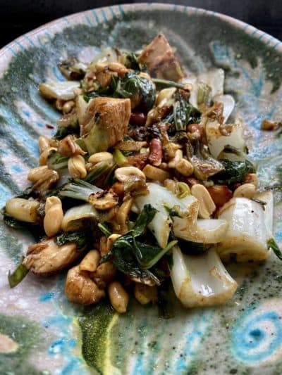 Stir-fried chicken with bok choy, ginger and peanuts. (Kathy Gunst)
