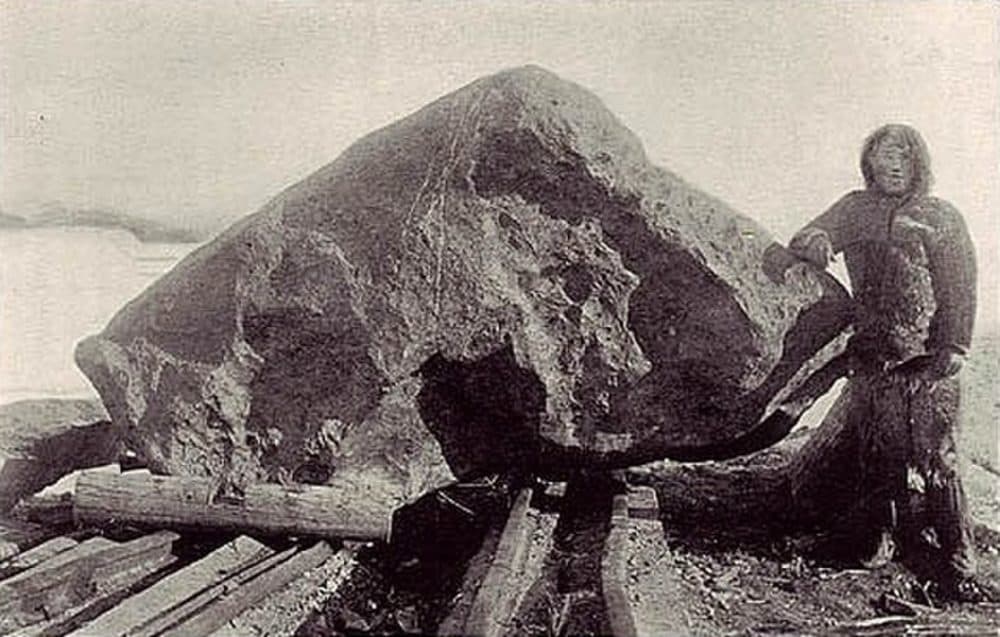 Robert Peary and the Ahnighito meteorite fragment in 1897.