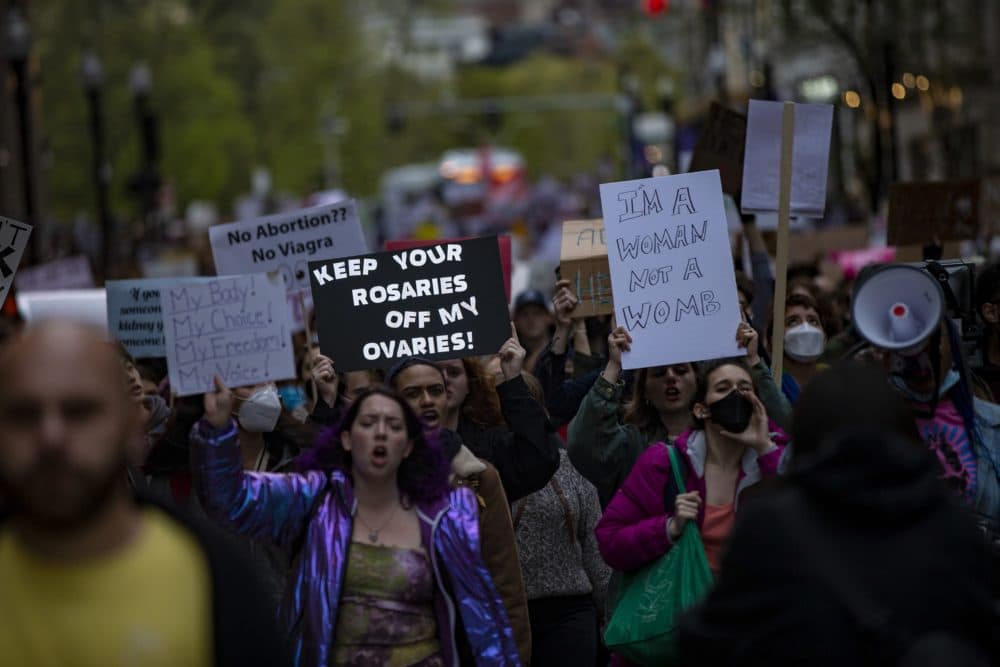 Thousands of protesters march down Tremont Street during a pro-abortion rights rally near the Massachusetts State House Tuesday. (Jesse Costa/WBUR)