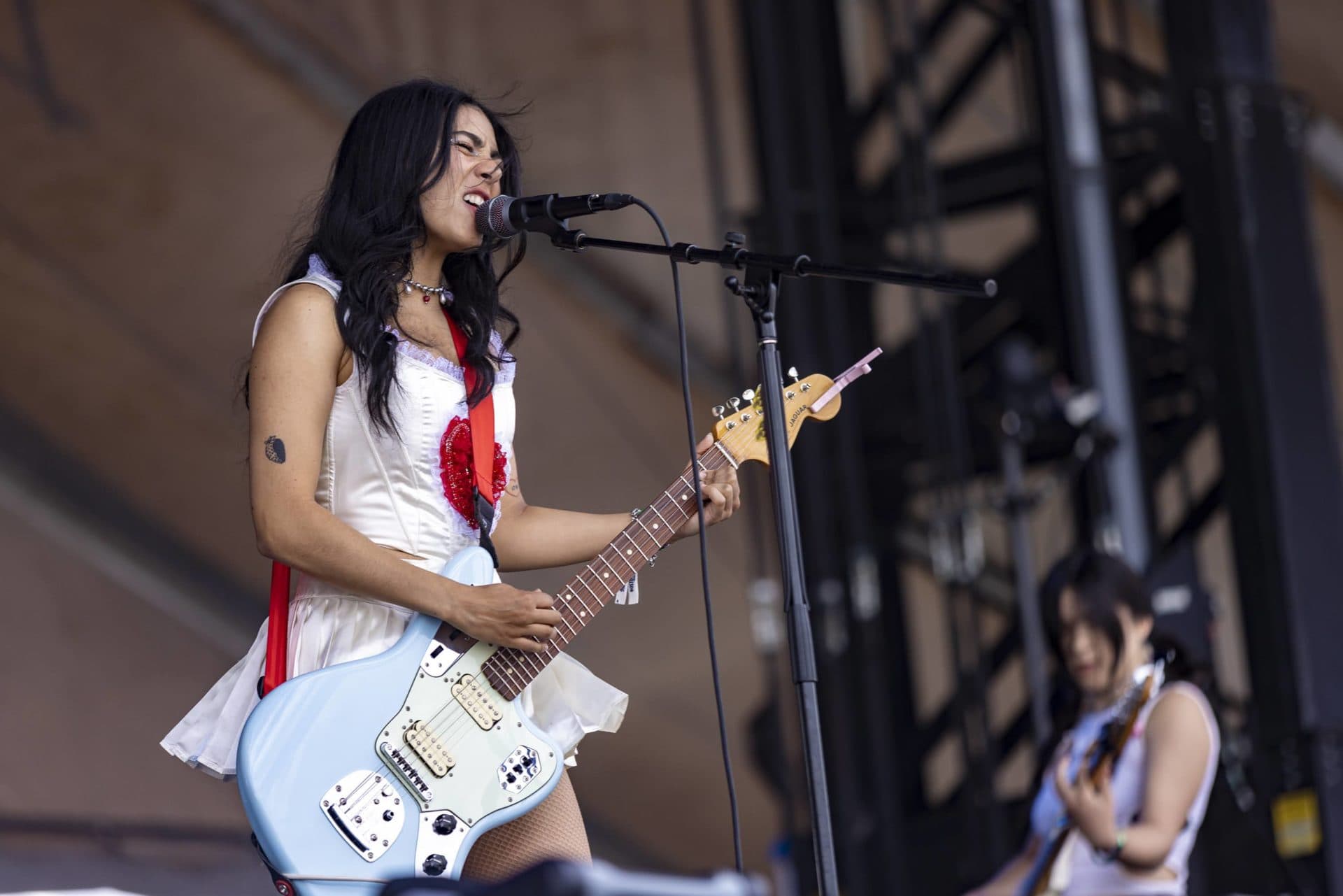 Mia Berrin of the Pom Pom Squad performs on the first day of the Boston Calling Music Festival. (Jesse Costa/WBUR)