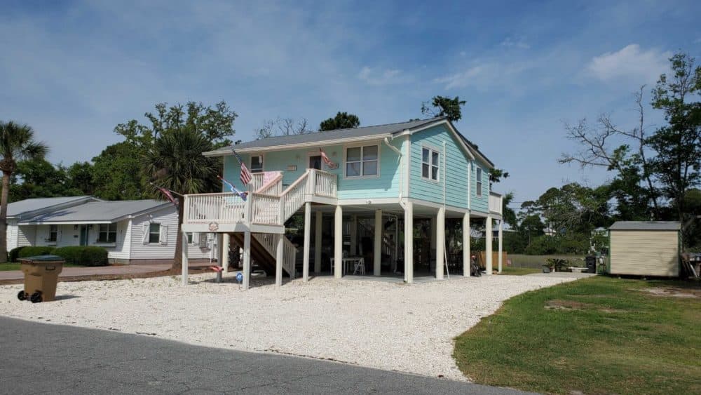 Larry and Donna Pipers’ house on Tybee Island now stands 11 feet above the ground, hopefully high enough to keep it out of future floods. (Emily Jones/WABE)
