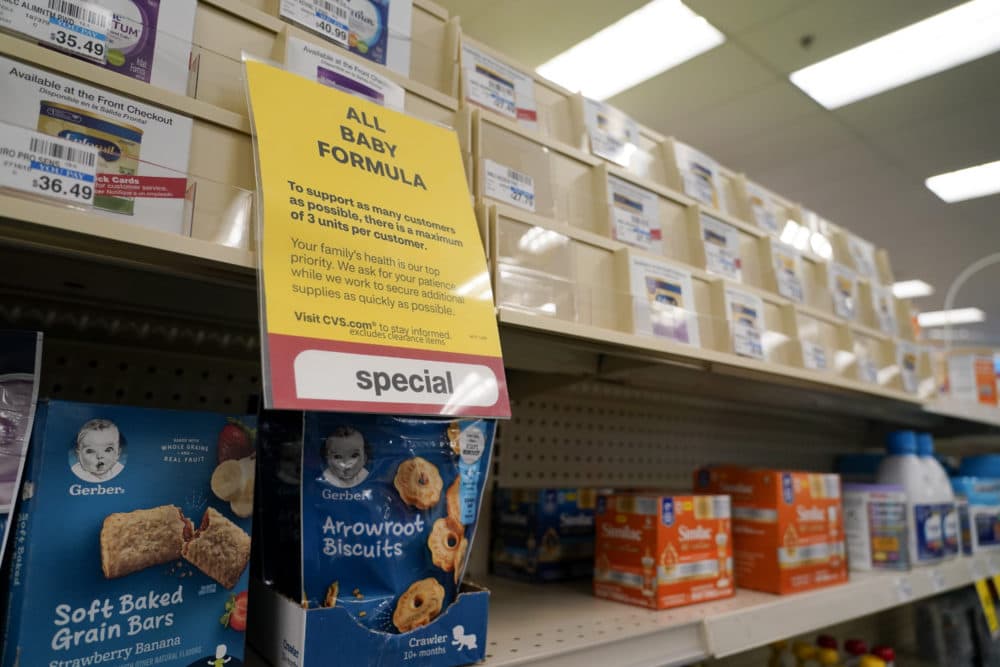 A sign at a CVS pharmacy notifies customers of the limit on buying baby formula during the shortage. (Chris Carlson/AP)