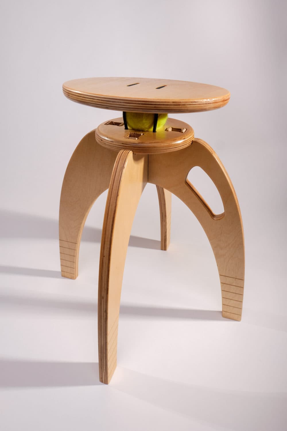 A ButtOn Chair for kids made with a tennis ball. Users found that tennis balls collapsed over time, so lacrosse balls were substituted. (Courtesy of QOR360)