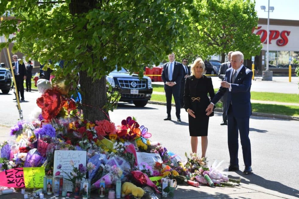 President Joe Biden and First Lady Jill Biden visit a memorial near a Tops grocery store in Buffalo, New York, on May 17, 2022. In remarks to mourners, he said "White supremacy is a poison. It's a poison running through ... our body politic." (Nicholas Kamm/AFP via Getty Images)