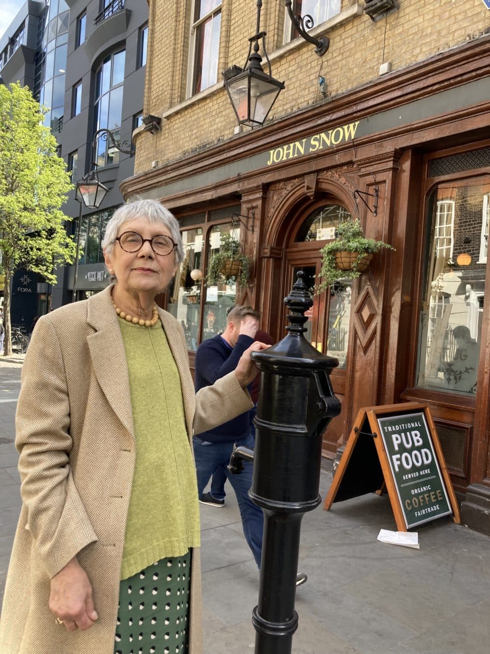 Author Sandra Hemphill at a replica of the historic Broad Street Pump in London. (Scott Tong/Here & Now)