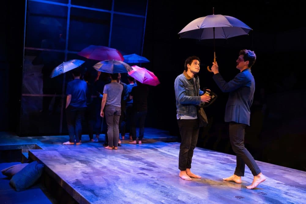 Mishka Yarovoy (center), Jared Reinfeldt (right) and members of the cast of SpeakEasy Stage Company’s "The Inheritance." (Courtesy Nile Scott Studios)