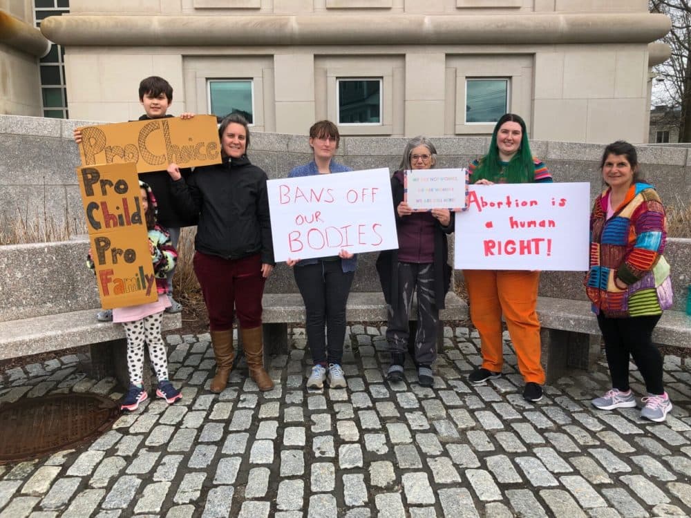 Abortion rights [rotesters stood in front of New Hampshire's federal courthouse on Tuesday. (Gabrielle Healy/NHPR)