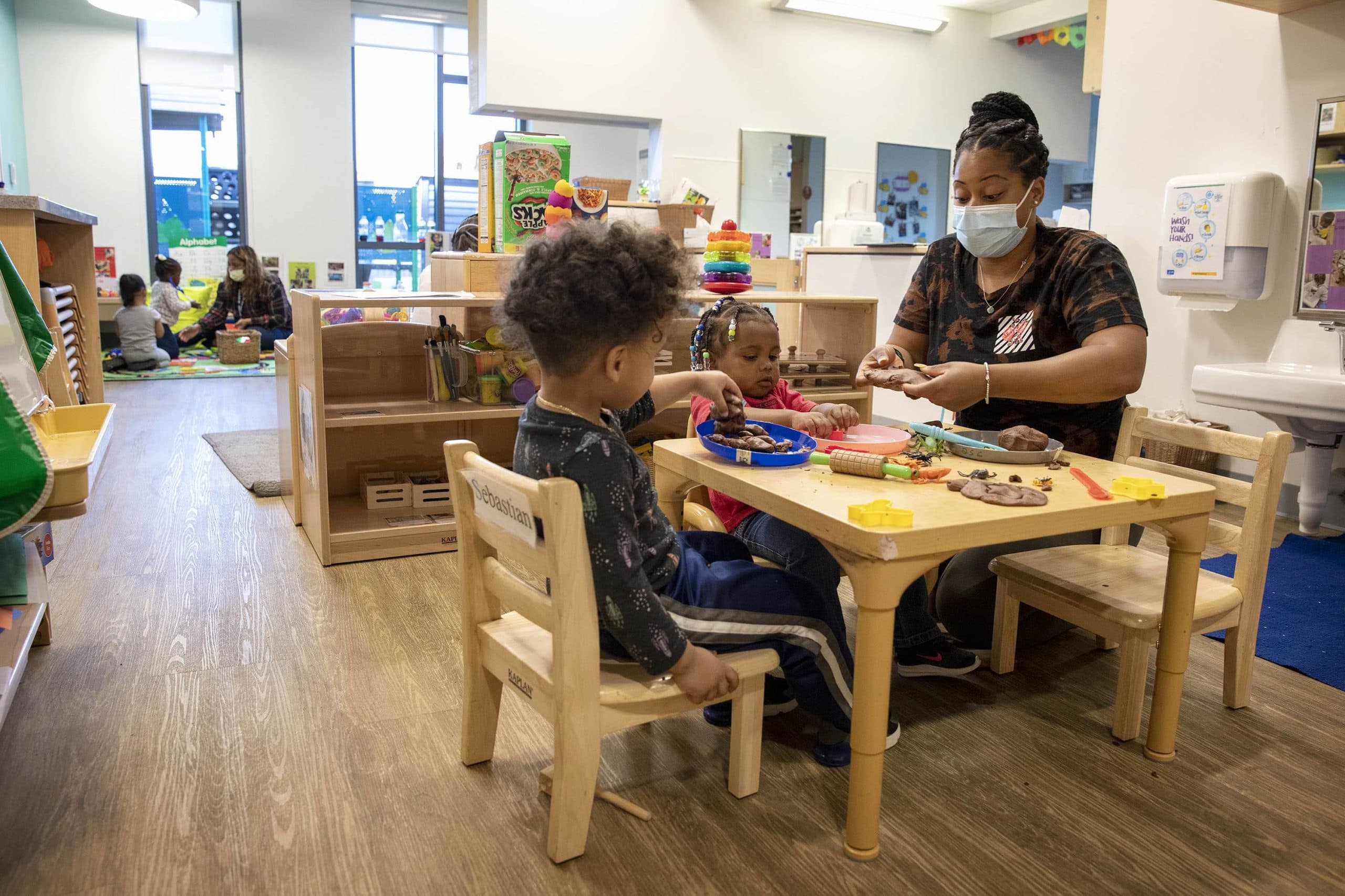 Teachers and children work on activities together at Horizons for Homeless Children in Boston.  (Robin Lubbock/WBUR)