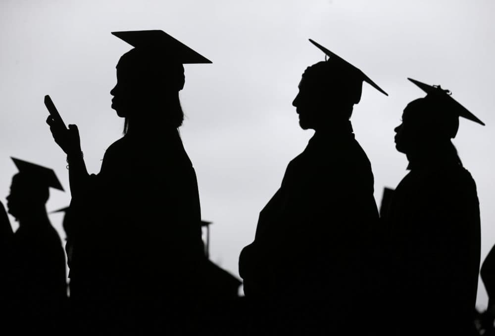 In this May 17, 2018, file photo, new graduates line up before the start of the Bergen Community College commencement at MetLife Stadium in East Rutherford, N.J. Seth Wenig/AP)