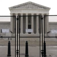 Steel fencing and barricades surround the Supreme Court i on June 22, the day before the court released its ruling overturning Roe v. Wade. (AP Photo/J. Scott Applewhite)