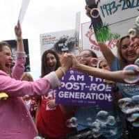 Anti-abortion campaigners celebrate outside the US Supreme Court in Washington, DC, on June 24, 2022. (Olivier Douliery/AFP via Getty Images)