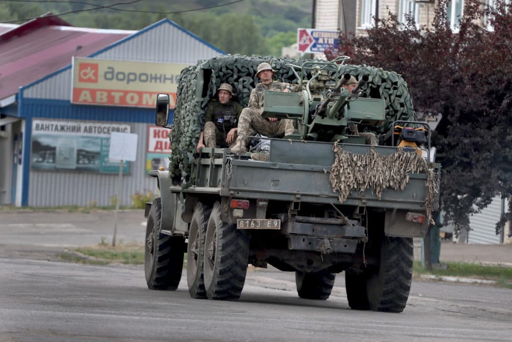 Soldiers ride in the back of a truck on June 17, 2022 in Kramatorsk, Ukraine. (Scott Olson/Getty Images)
