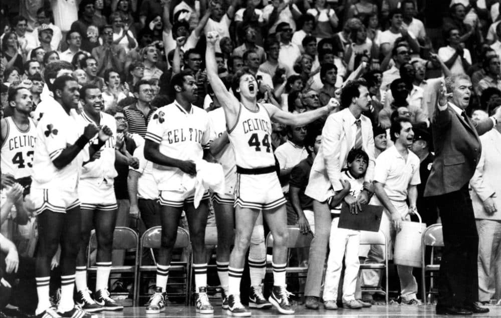 Players rejoice on the Boston Celtics bench during Game 7 of the 1984 NBA Finals between the Boston Celtics and the Los Angeles Lakers at the Boston Garden on June 12, 1984. (John Tlumacki/The Boston Globe via Getty Images)