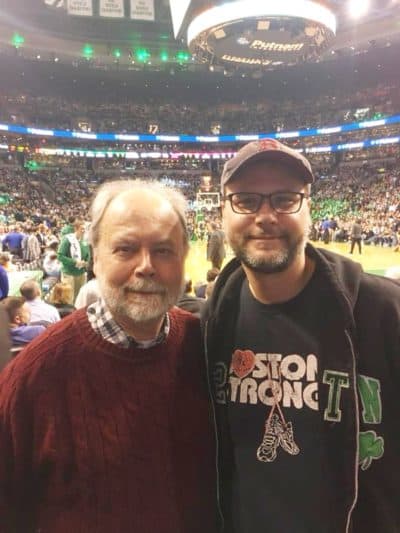 The author and his father, a life-long advocate for social justice and a converted Knicks fan, at TD Garden in 2017. (Courtesy Alastair Moock)